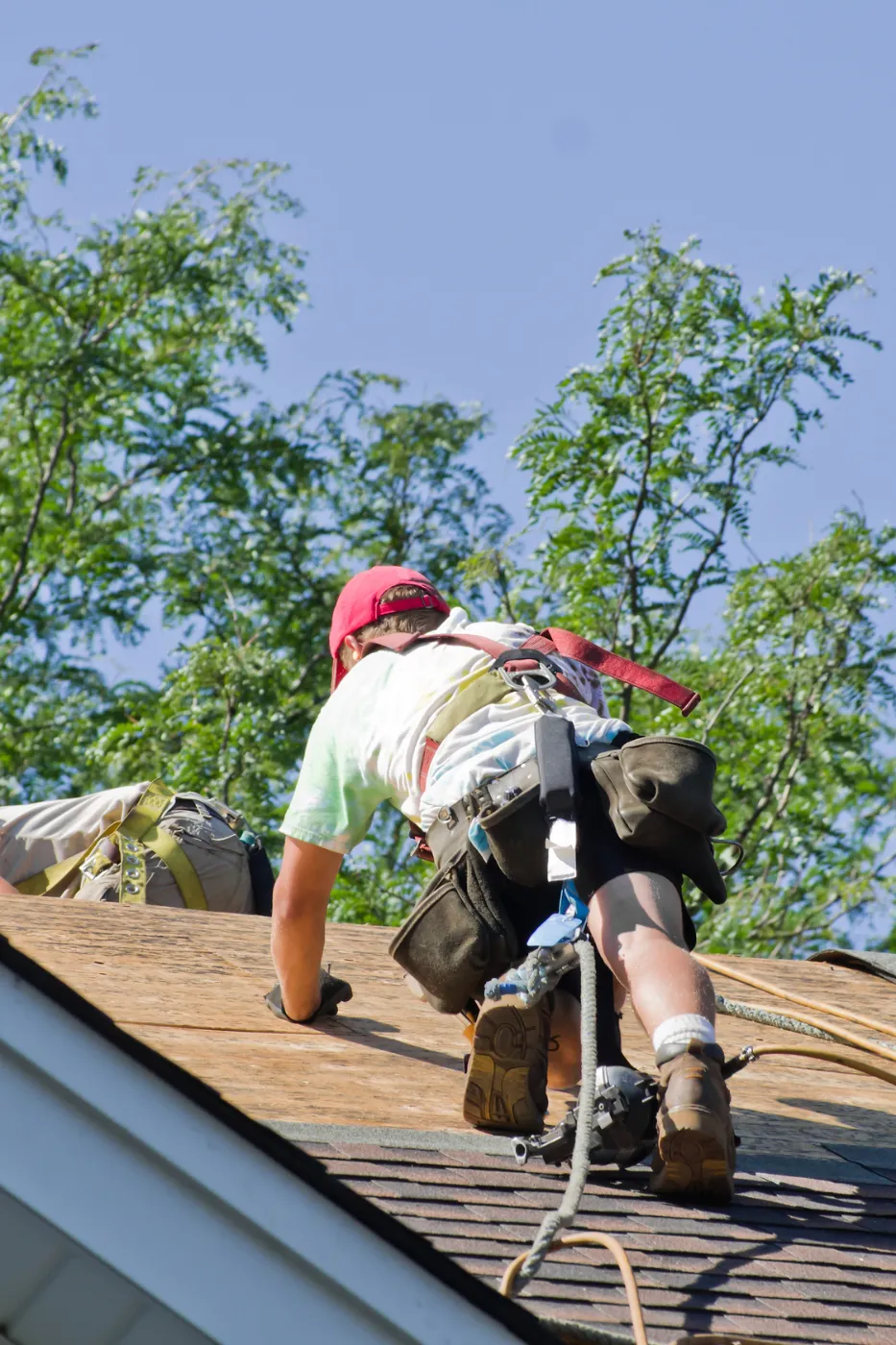 Roofing franchise team reviewing multi-location marketing dashboards